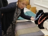 Linda admires the samples from this month's meeting